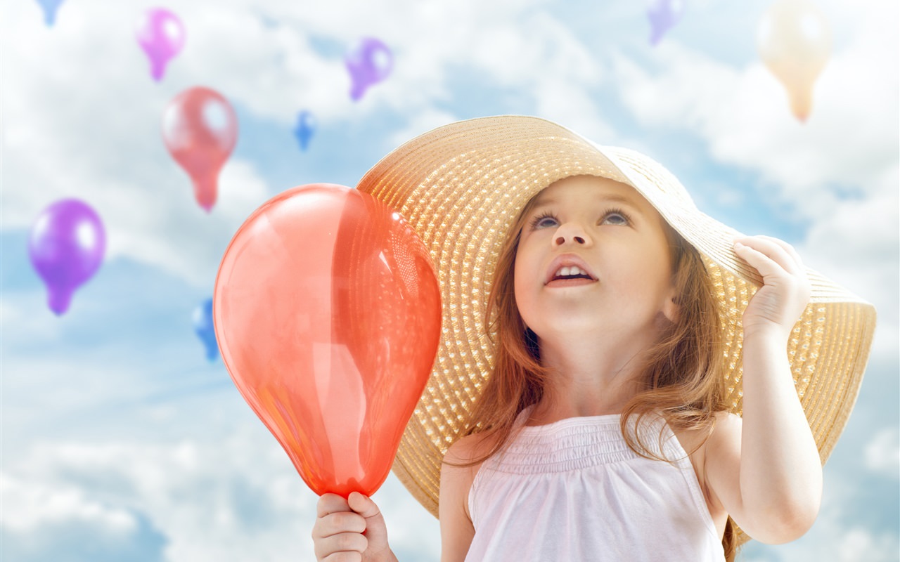 Cute Little Girl with Balloons