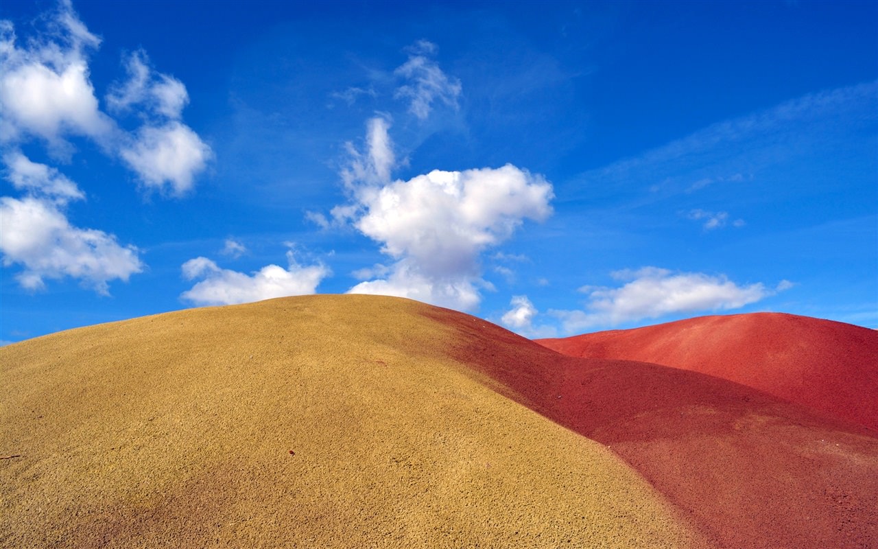 Desert sand dunes blue sky