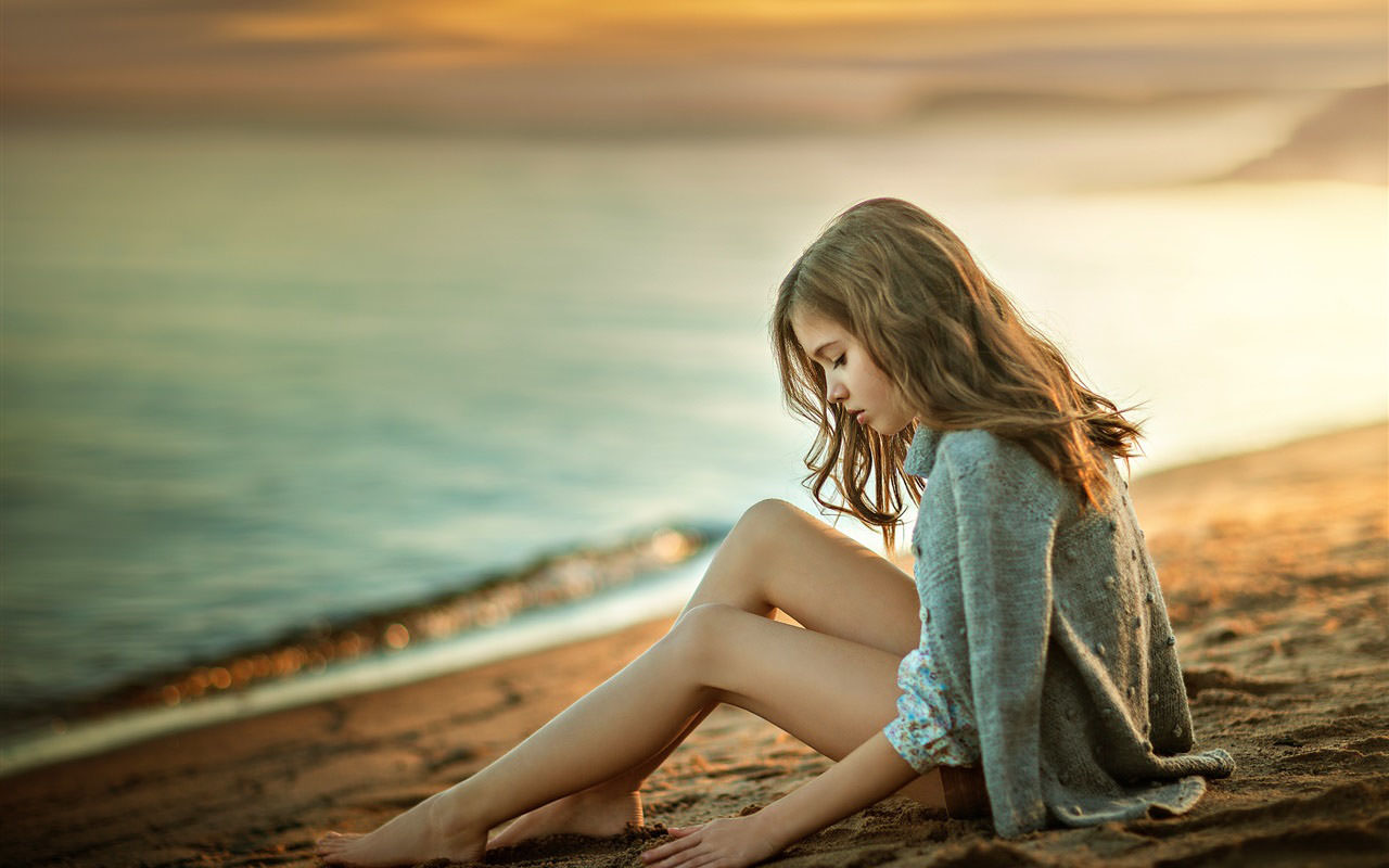 Girl Sit on Beach