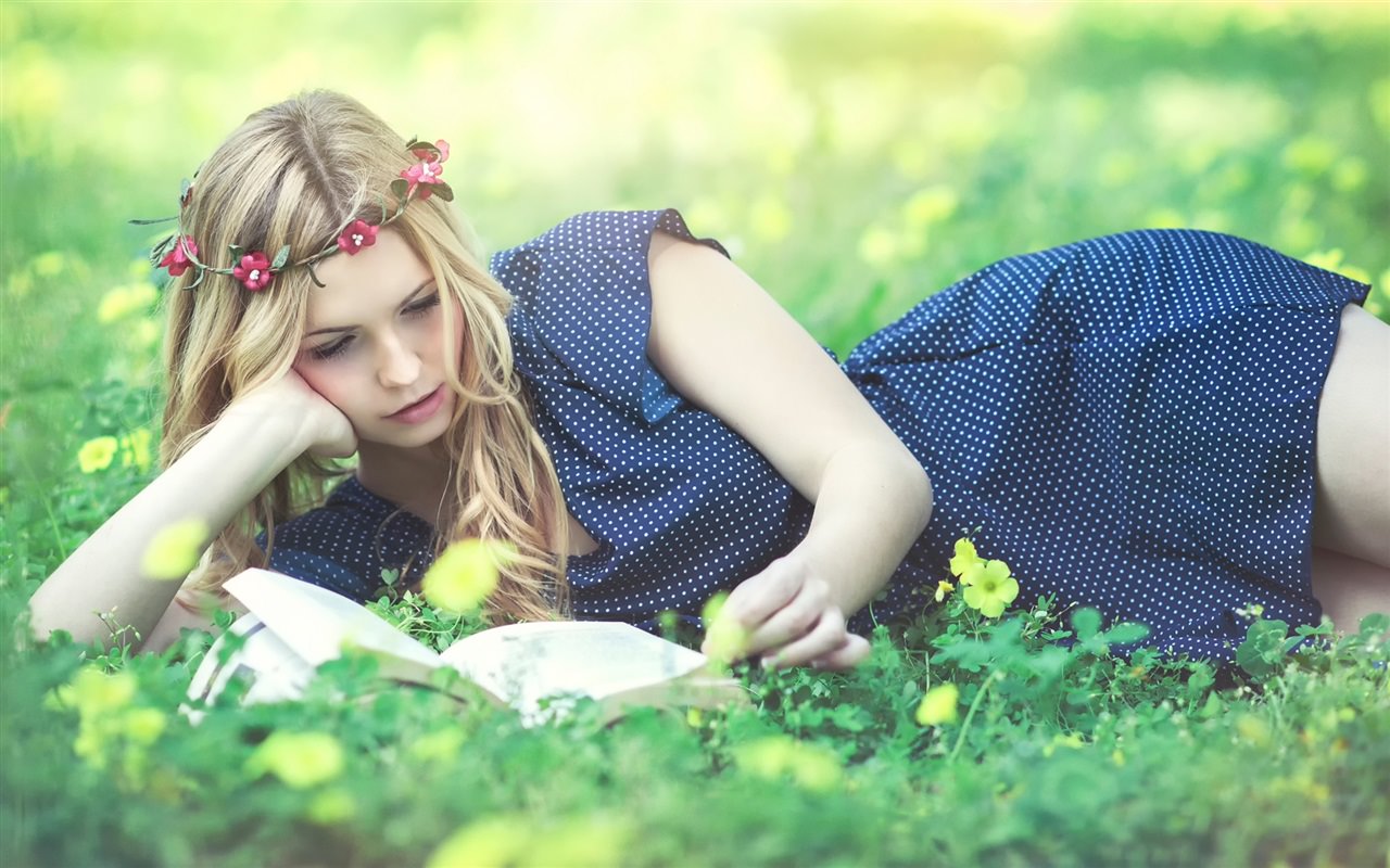 Beautiful Blonde Girl Read a Book