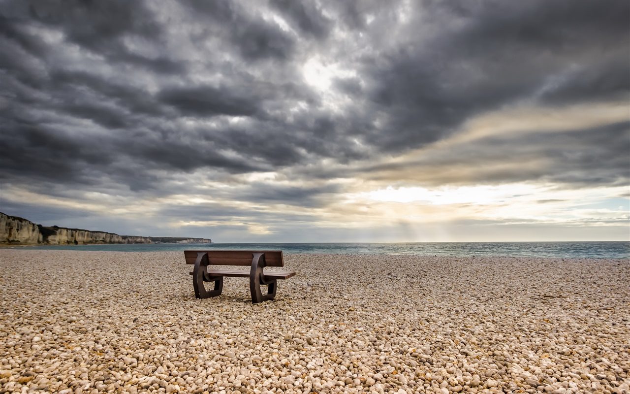 Lonely Bench on the Beach