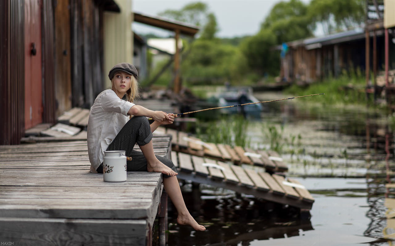 A Blonde Girl Fishing
