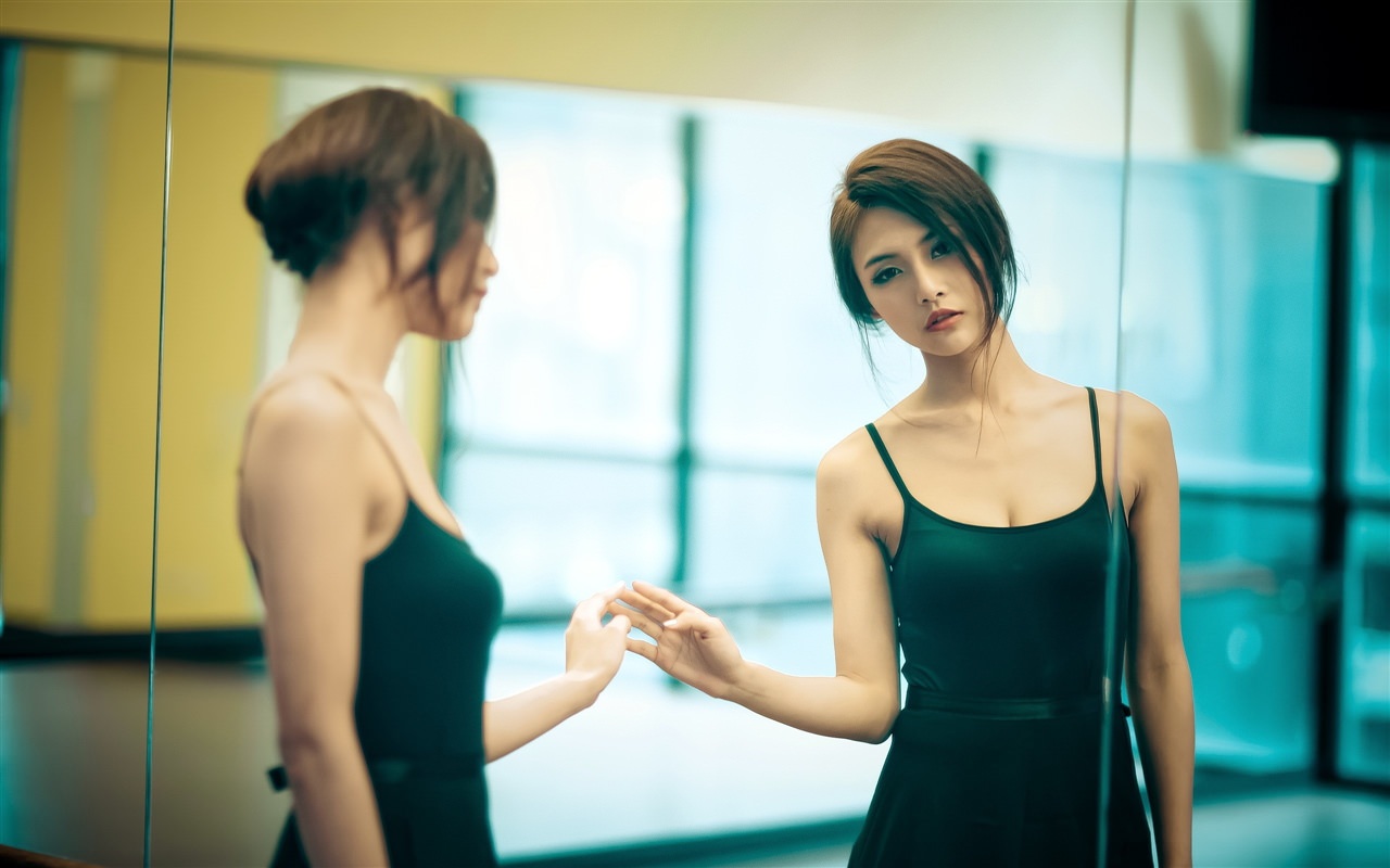 Beauty Asian Girl with Mirror