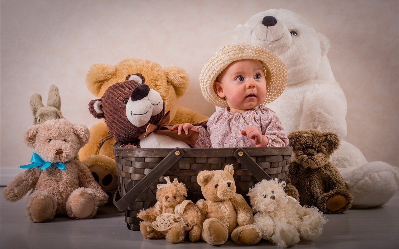 Cute Baby with Teddy Bears