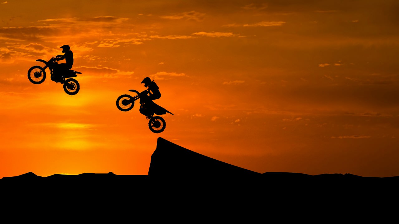 Stunt Bike Race Sunset Silhouette