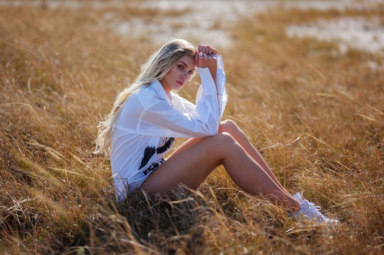 Girl Sitting in a Field