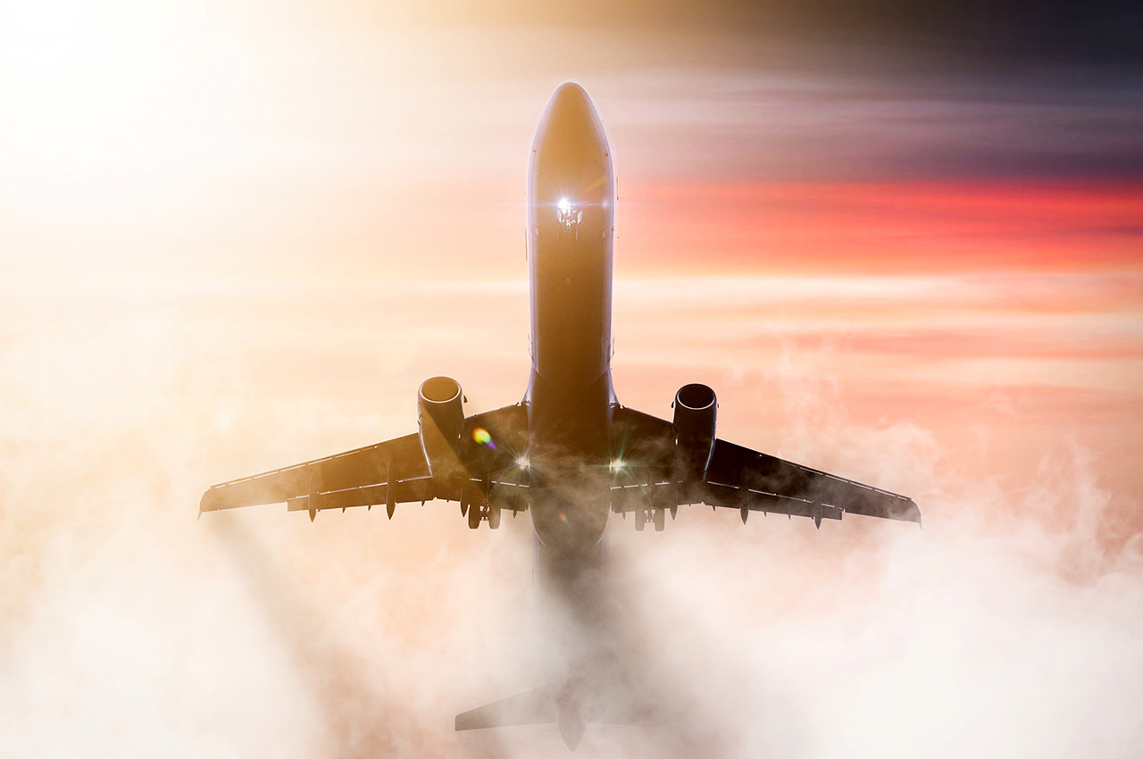 Passenger Plane Flight in Cloud