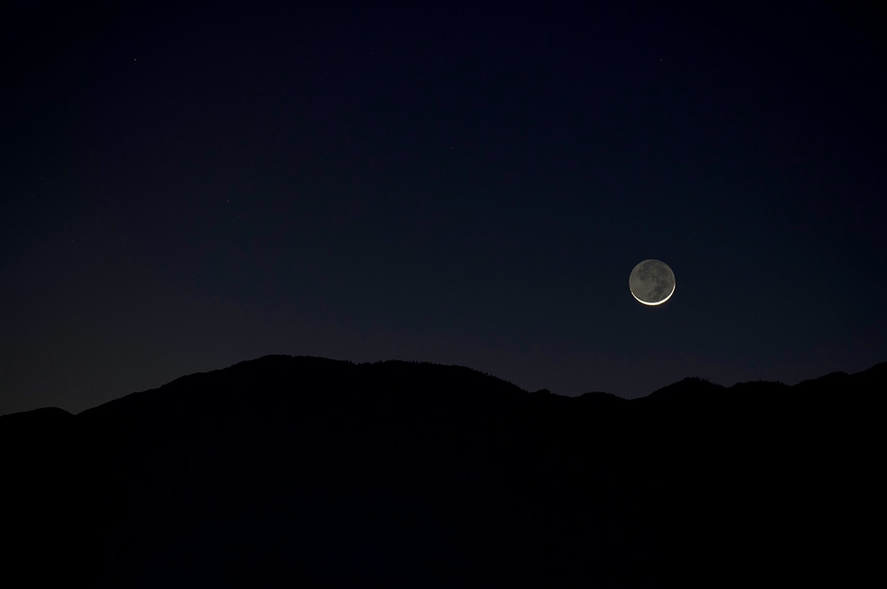 Moonset above Mountain
