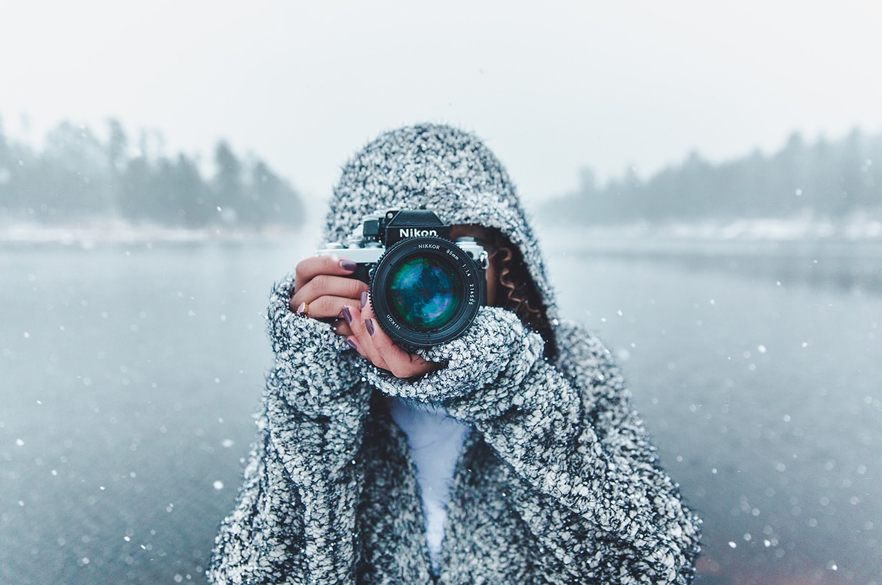Photographer Woman in the Snowfall